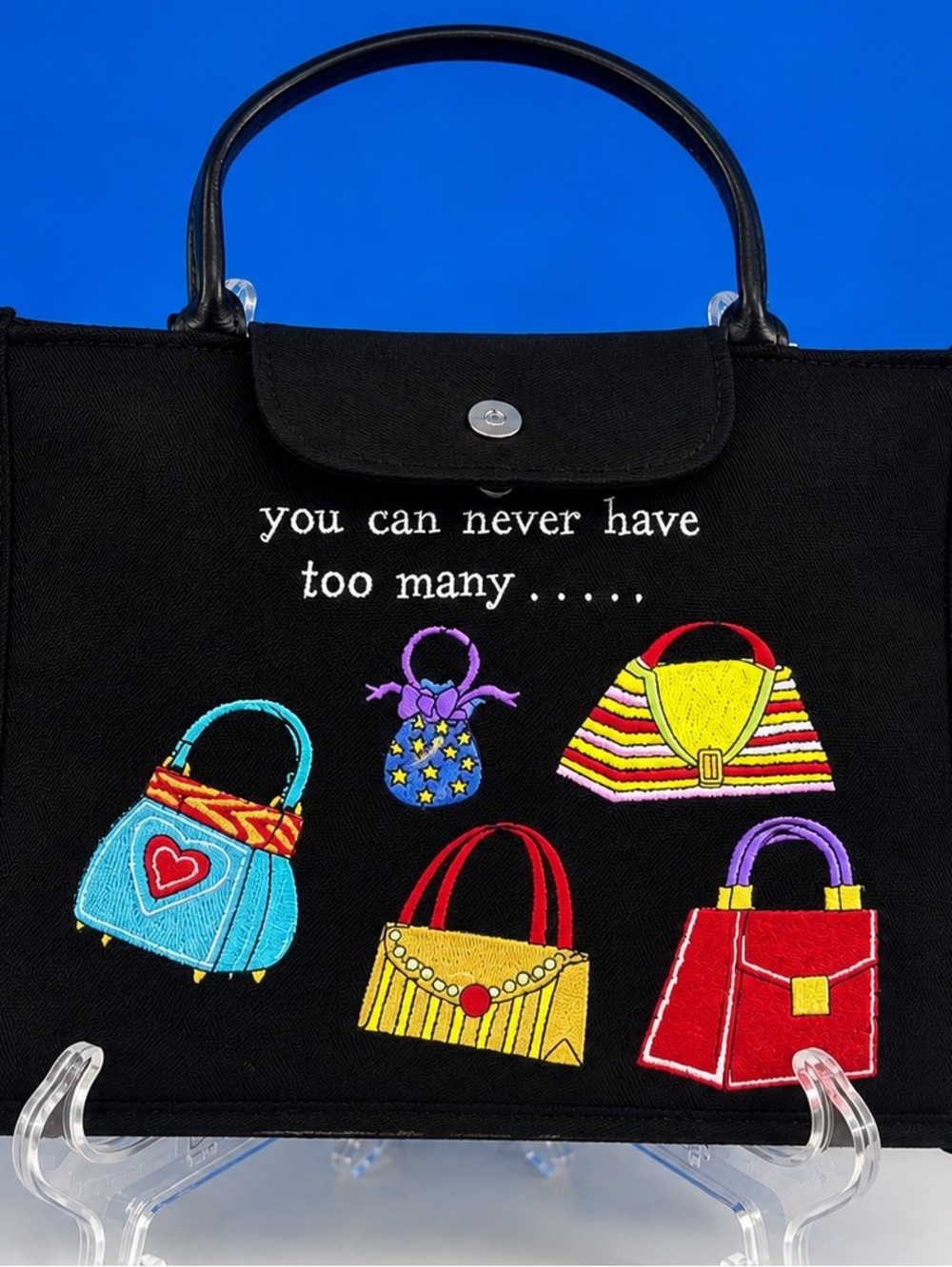 Fun and playful Girlfriend brand purse featuring colorful embroidered handbag